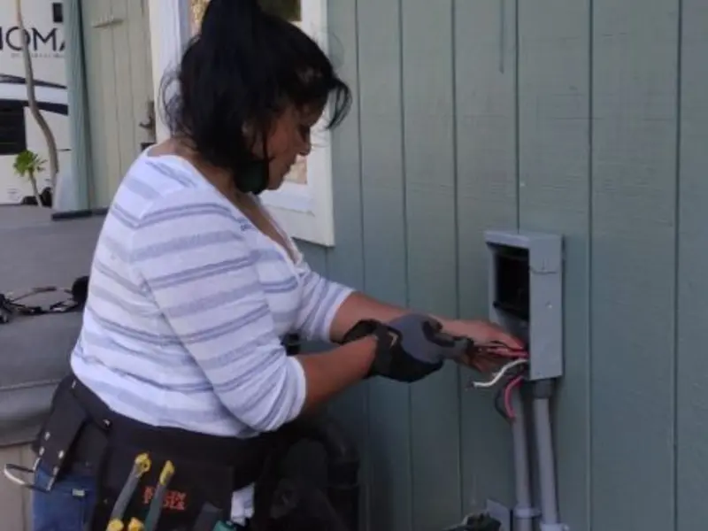 Licensed electrician wiring an exterior subpanel in Elk Plain